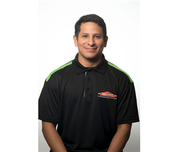 male, clean shaven black servpro shirt